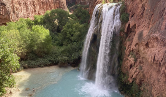Dozens of tourists have complained of falling ill on a recent visit to a popular and picturesque stretch of waterfalls deep in a gorge neighboring Grand Canyon National Park.