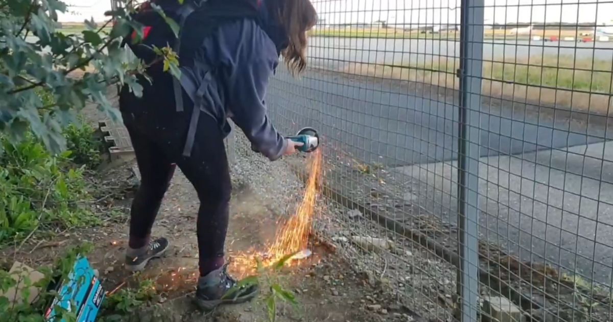 Radical climate activists cut through an airport fence in Britain.