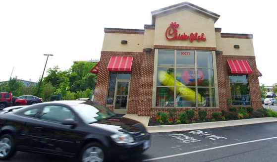 Patrons enter the drive-thru at a Chick-fil-A restaurant in a file photo from August 2012.