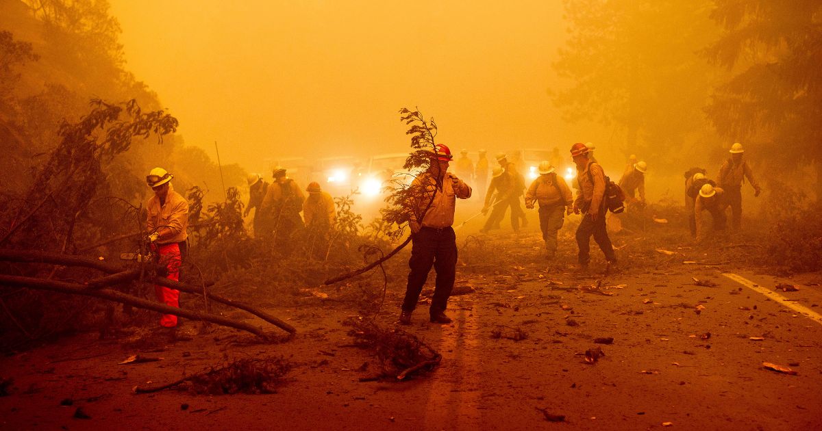 firefighters battling the Dixie Fire clearing Highway 89