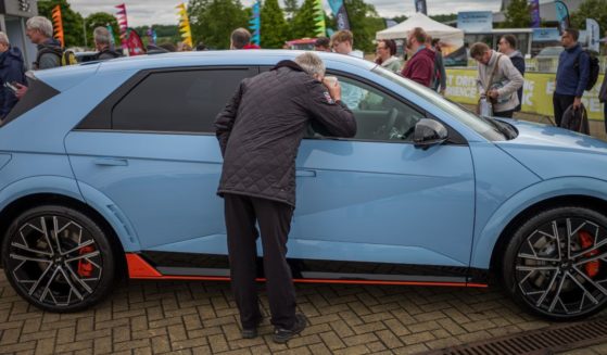 Visitors attend on the first day of the Everything Electric North Show on May 24, 2024 in Harrogate, England.