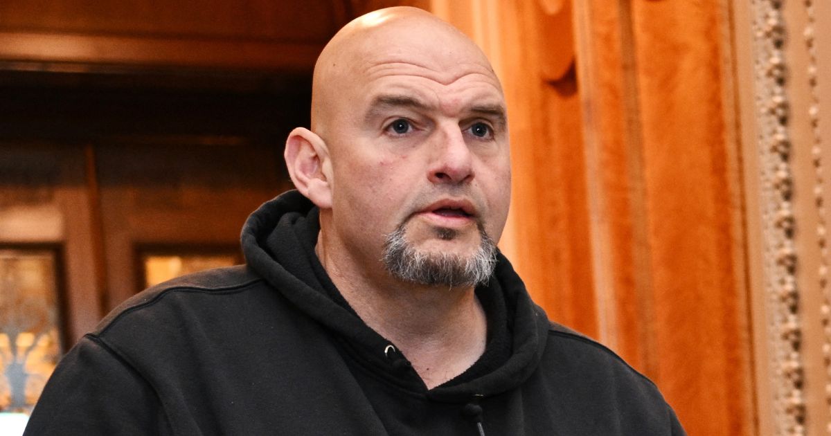 Sen. John Fetterman of Pennsylvania exits the Senate Chamber ahead of a vote on a foreign aid package at the Capitol in Washington on April 23.