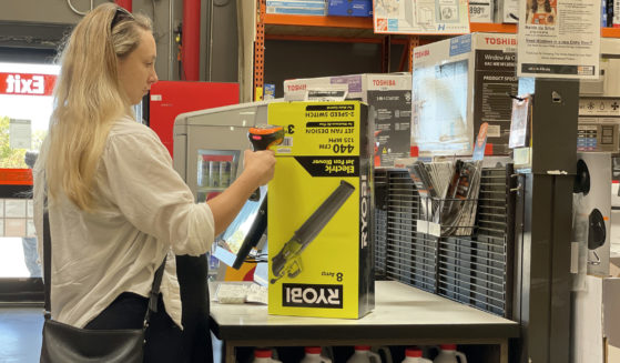 A customer makes a purchase in a self-checkout lane at a Home Depot store in San Rafael, California, last July. Another store, Dollar General, reportedly ended self-checkout at about 3,000 locations just last month.