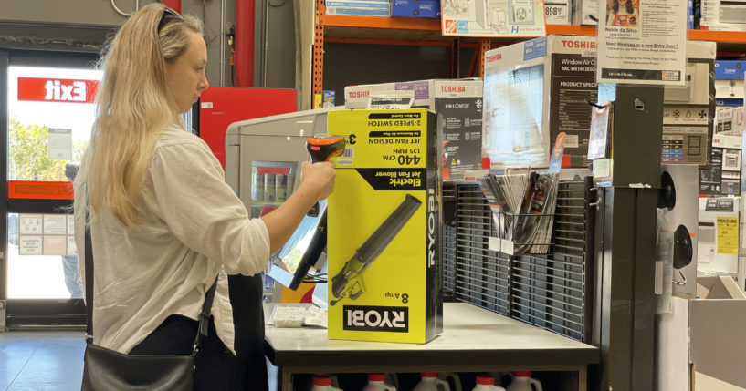 A customer makes a purchase in a self-checkout lane at a Home Depot store in San Rafael, California, last July. Another store, Dollar General, reportedly ended self-checkout at about 3,000 locations just last month.