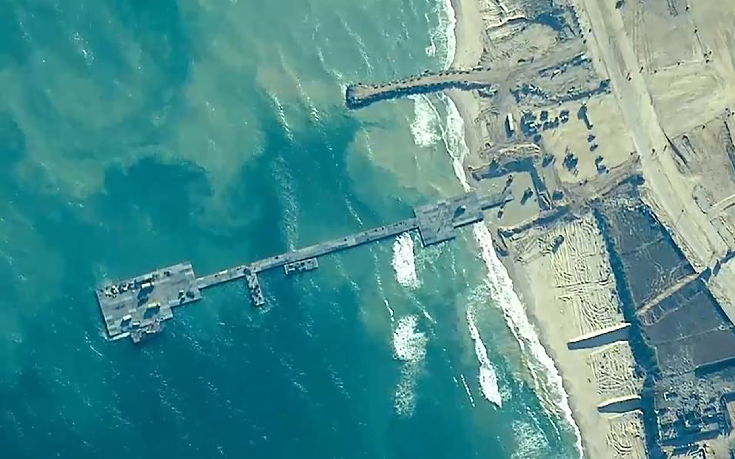 Military Relocates Biden’s Gaza Pier for Third Time Due to Weather Issues