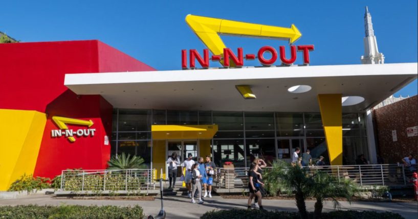 People walk out of an In-N-Out in Westwood in Los Angeles, California in a file photo from February 2022.