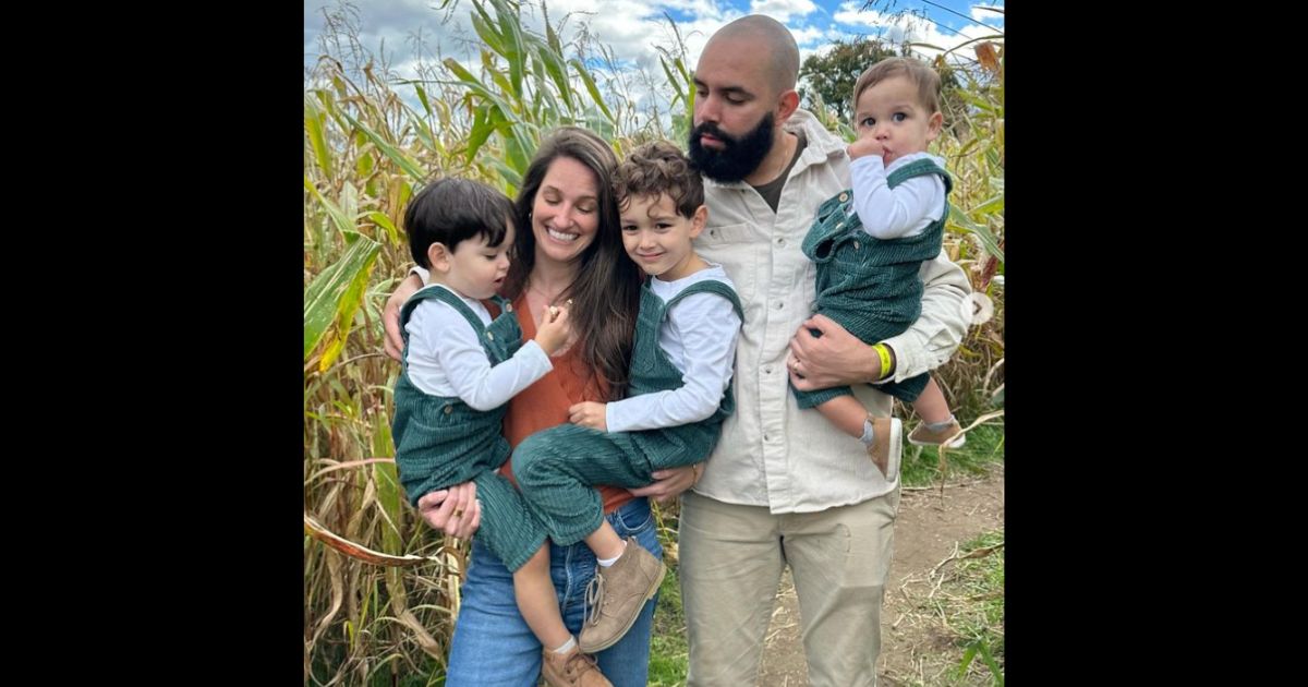 Janet Moreno with her husband and three children in a family photo.