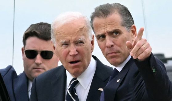 President Joe Biden talks with his son Hunter Biden upon arrival at Delaware Air National Guard Base in New Castle, Delaware, Tuesday. A jury found Hunter Biden guilty this week on federal gun charges in a historic first criminal prosecution of the child of a sitting U.S. president. The 54-year-old son of President Joe Biden was convicted on all three of the federal charges facing him, CNN and other media reported.