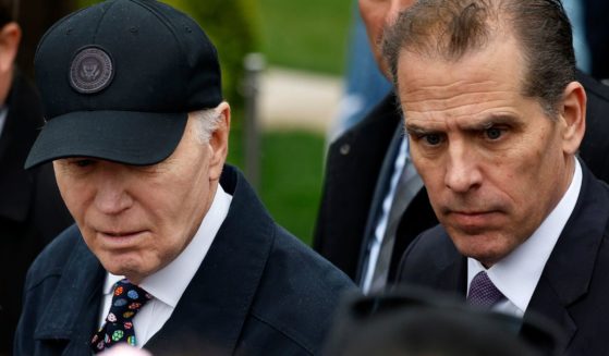 President Joe Biden and his son, Hunter Biden, look on during the White House Easter Egg Roll on the South Lawn in Washington on April 1.