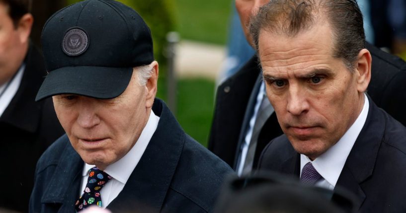 President Joe Biden and his son, Hunter Biden, look on during the White House Easter Egg Roll on the South Lawn in Washington on April 1.