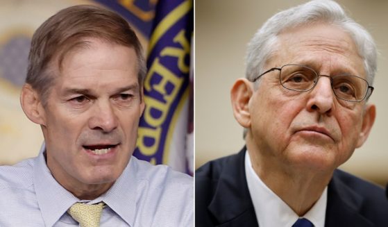 GOP Rep. Jim Jordan of Ohio, left, urged the House of Representatives Wednesday to hold Attorney General Merrick Garland, right, in contempt of Congress for refusing to provide audio recordings of interviews with President Joe Biden.