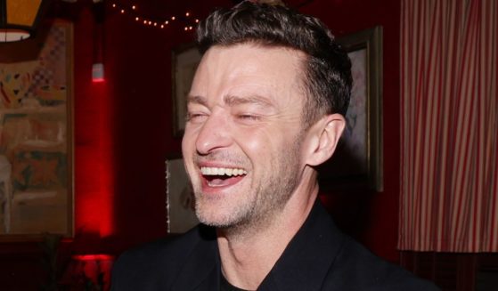 Justin Timberlake laughs during his album release party at Dan Tana's in West Hollywood, California, on March 14.