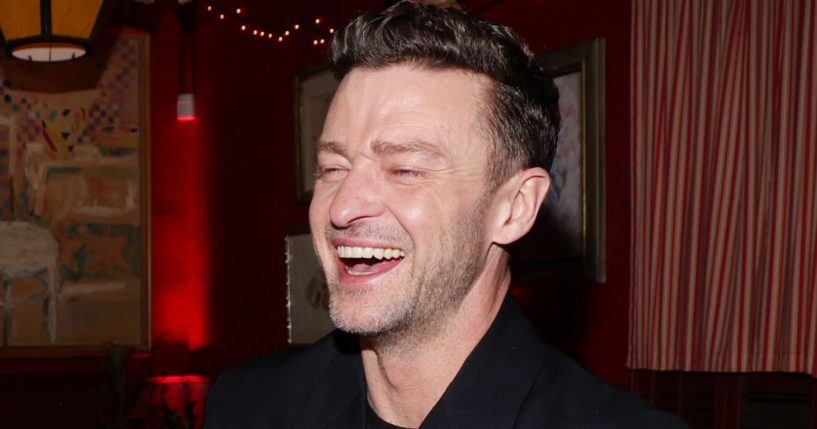 Justin Timberlake laughs during his album release party at Dan Tana's in West Hollywood, California, on March 14.