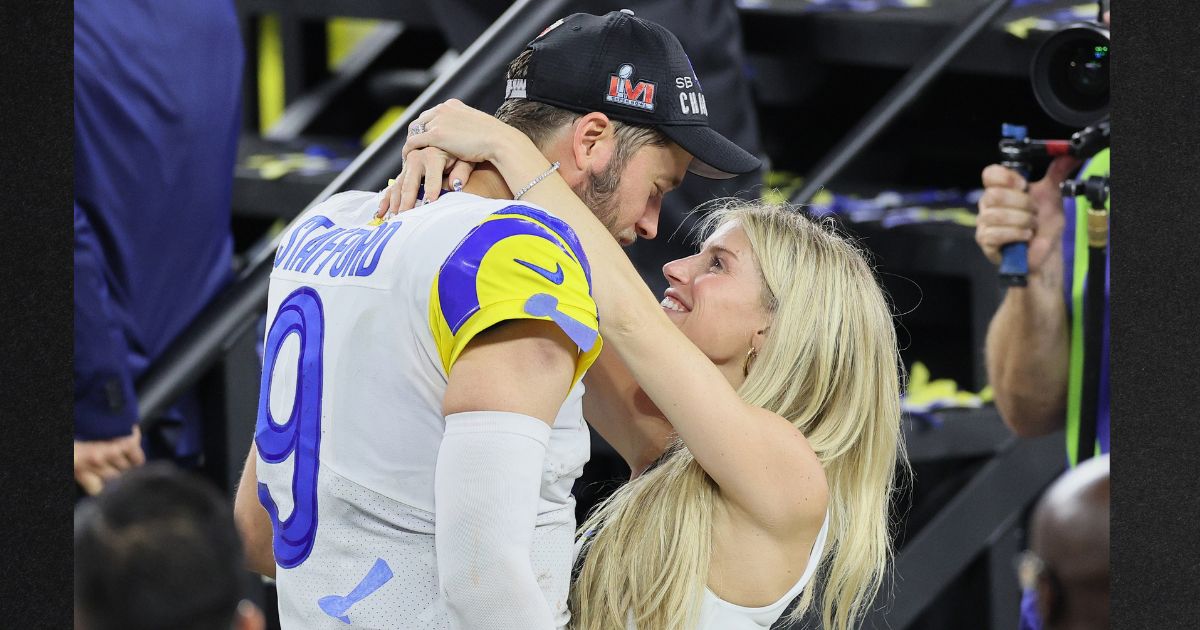 Matthew Stafford #9 of the Los Angeles Rams celebrates with his wife Kelly Stafford during Super Bowl LVI at SoFi Stadium on Feb. 13, 2022, in Inglewood, California.