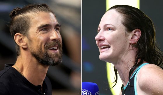 At left, Michael Phelps attends a game in the National League Championship Series between the Arizona Diamondbacks and the Philadelphia Phillies at Chase Field in Phoenix on Oct. 20, 2023. At right, Cate Campbell is interviewed after competing in the women’s 50m freestyle final during the 2024 Australian swimming trials at Brisbane Aquatic Centre in Brisbane on June 15.