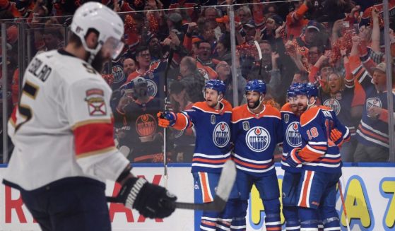 Darnell Nurse of the Edmonton Oilers celebrates with teammates after scoring a goal against the Florida Panthers