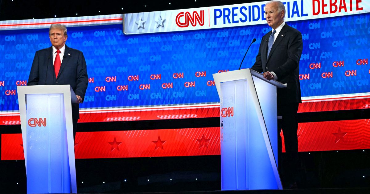 President Joe Biden, right, and former President Donald Trump, left, participate in the first presidential debate of the 2024 elections at CNN's studios in Atlanta, Georgia, on Thursday.