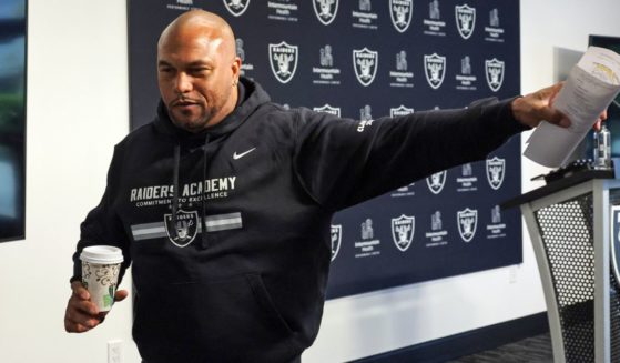 Head coach Antonio Pierce of the Las Vegas Raiders waves as he leaves a news conference during mandatory minicamp at the Las Vegas Raiders Headquarters / Intermountain Healthcare Performance Center on June 13 in Henderson, Nevada.
