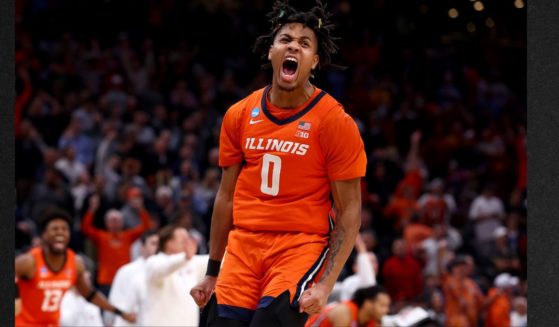 Terrence Shannon Jr. of the Illinois Fighting Illini celebrates a basket against the Iowa State Cyclones during the second half in the Sweet 16 round of the NCAA Men's Basketball Tournament at TD Garden on March 28 in Boston, Massachusetts.