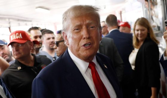 Republican presidential candidate and former President Donald Trump greets people at Tony and Nick's Steaks in Philadelphia on Saturday.