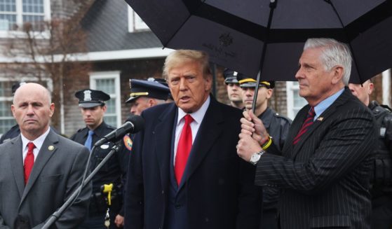 Former President Donald Trump speaks to the media after attending the wake of slain NYPD officer Jonathan Diller at the Massapequa Funeral Home on March 28, 2024, in Massapequa, New York.