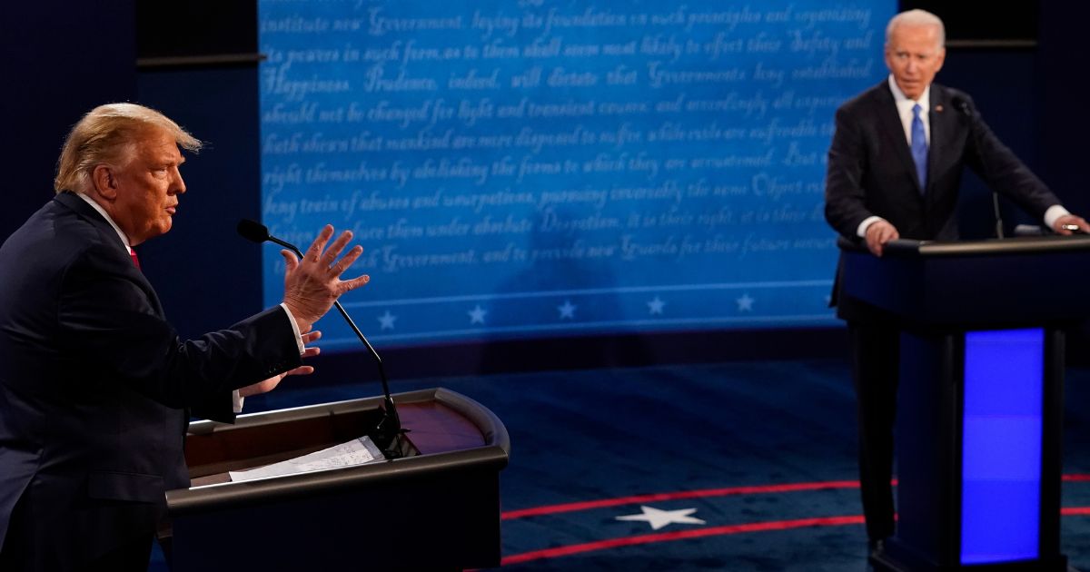 Then-President Donald Trump responds to then-Democratic presidential candidate President Joe Biden during the second and final presidential debate on Oct. 22, 2020, in Nashville, Tennessee.