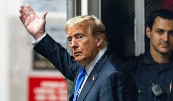 Former President Donald Trump gestures as he exits the courtroom on May 30 during his criminal trial at Manhattan Criminal Court in New York City.