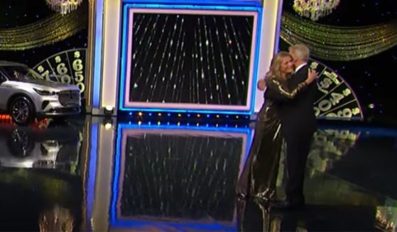 Vanna White and Pat Sajak embrace after White said goodbye to Sajak in an emotional, pre-recorded video on Thursday night’s “Wheel of Fortune." Sajak is retiring after more than four decades on the popular game show.