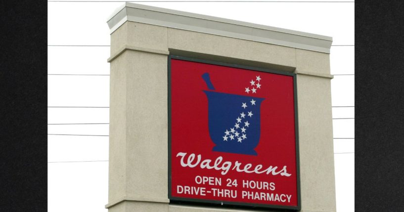 Walgreens signage is displayed outside a Walgreens store in Niles, Illinois in a 2003 file photo.