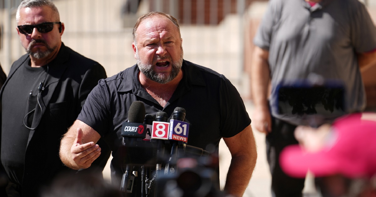 InfoWars founder Alex Jones speaks to the media outside Waterbury Superior Court Sept. 21, 2022, during his defamation trial on September 21, 2022 in Waterbury, Connecticut.