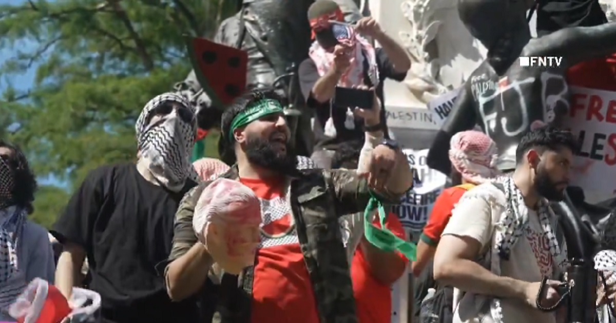 Video: Protesters in DC with Bloodied Biden Mask Embarrass Democrats