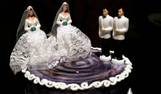 Same-sex wedding cake topper figurines are seen at Cake and Art cake decorators June 10, 2008 in West Hollywood, California.