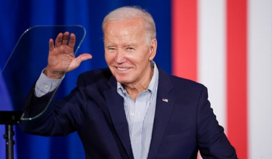 President Joe Biden grins in a March file photo in Las Vegas in March.