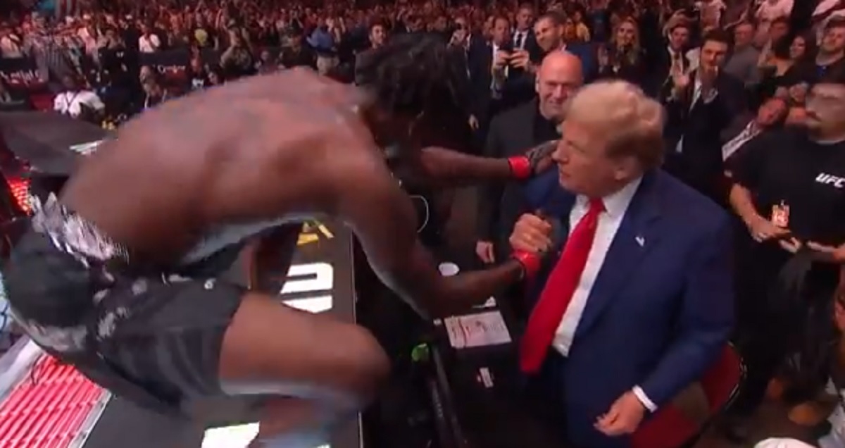 UFC fighter Kevin Holland shakes former President Donald Trump's hand have winning a bout Saturday night.