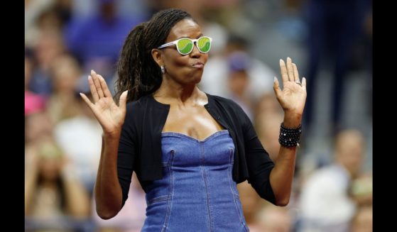 Former first lady of the United States Michelle Obama reacts during a ceremony honoring 50 years of equal pay at the U.S Open during the Women/Men's Singles First Round matches on Day One of the 2023 US Open at the USTA Billie Jean King National Tennis Center on August 28, 2023 in the Flushing neighborhood of the Queens borough of New York City.