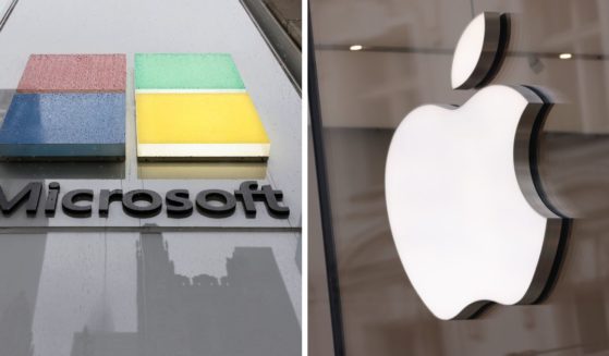 (L) The Microsoft logo is seen at an Experience Center on Fifth Avenue on April 3, 2024 in New York City. (R) The Apple logo hangs on an Apple Store on March 25, 2024 in Berlin, Germany.