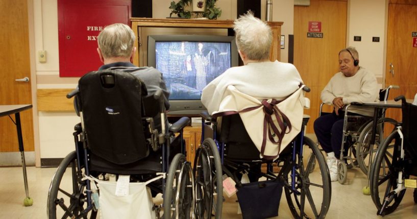 Residents gather in the lounge area of their living quarters at the Quincy Veterans Home in Quincy, Illinois, on Feb. 16, 2005.