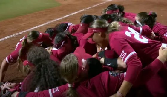 This YouTube screen shot shows the Oklahoma Sooners softball team celebrating a fourth consecutive Women's College Softball World Series win on June 6, 2024.