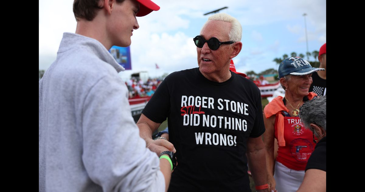 Roger Stone greets people before former U.S. President Donald Trump and Sen. Marco Rubio (R-FL) take the stage to headline a rally at the Miami-Dade County Fair and Exposition on November 6, 2022 in Miami, Florida.