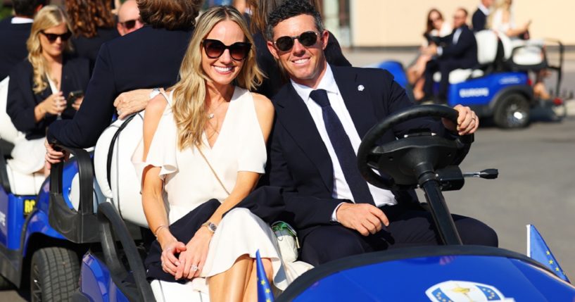 Golf star Rory McIlroy and his wife, Erica, are smiling in a 2023 file photo in Rome at the opening ceremony of the Ryder Cup competition.