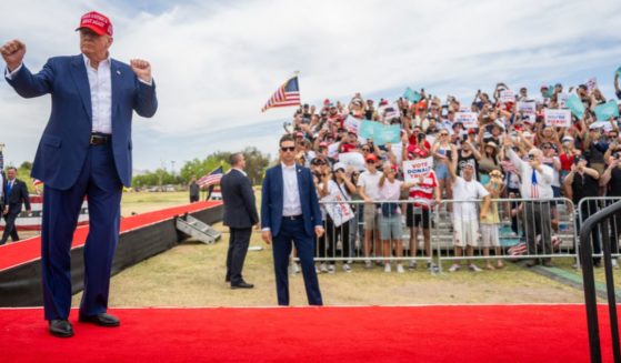 Republican presidential candidate, former U.S. President Donald Trump dances upon arrival at his campaign rally at Sunset Park on June 9, 2024 in Las Vegas, Nevada.