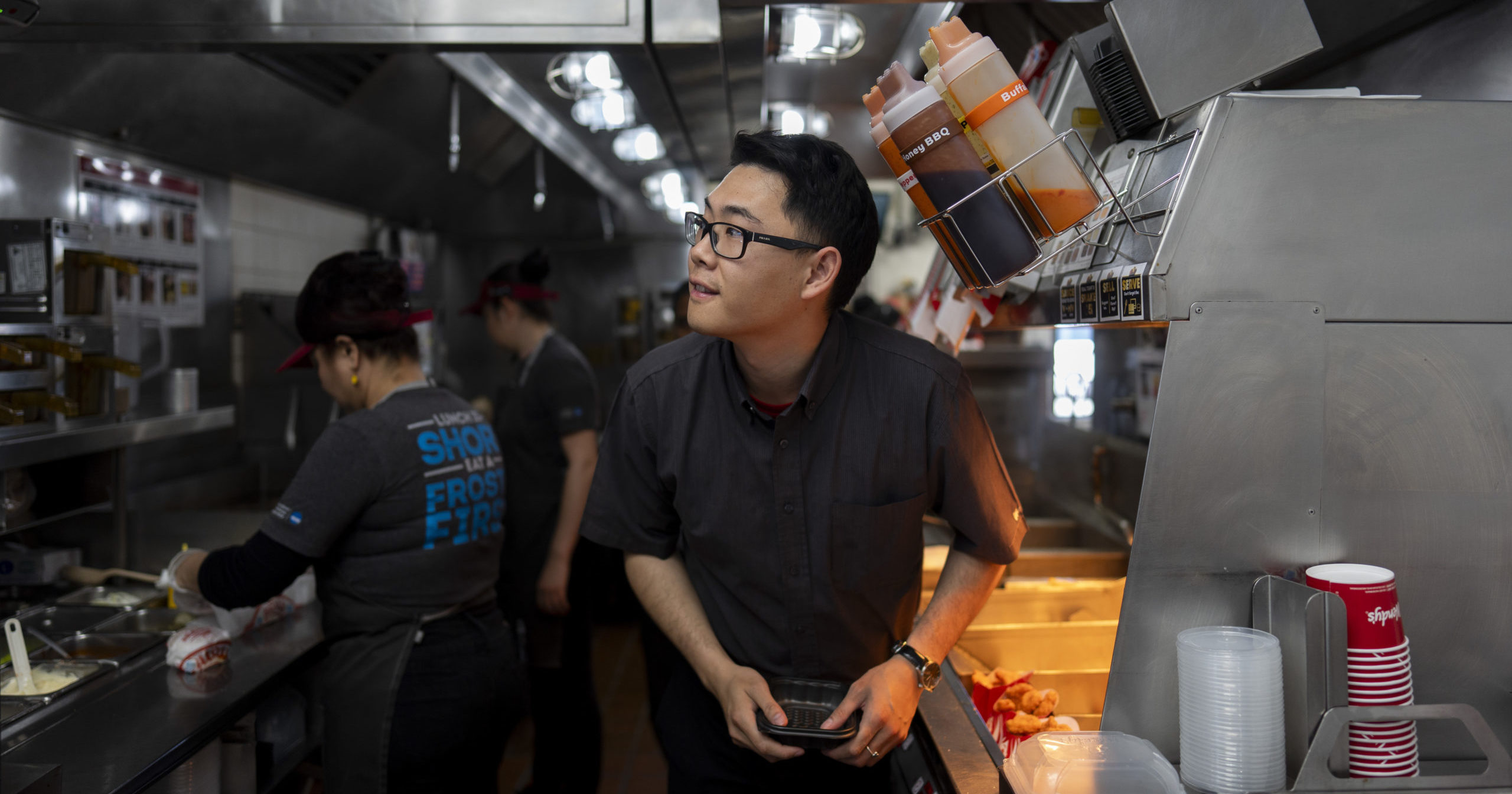 Lawrence Cheng, whose family owns seven Wendy's locations south of Los Angeles, works in the kitchen at his Wendy's restaurant in Fountain Valley, California, on June 20.