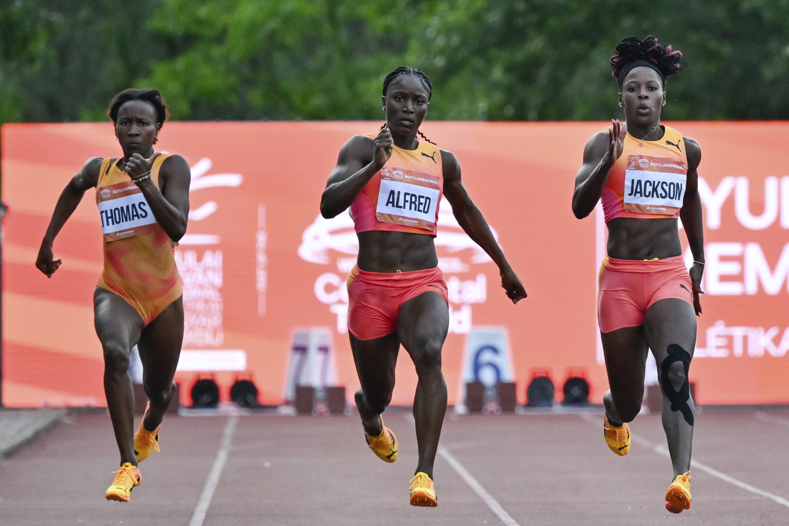 Lanea-Tava Thomas of Jamaica, left; Julien Alfred of St. Lucia, center; and Shericka Jackson of Jamaica, right, compete in the 200 meter event at the Gyulai Istvan Memorial Track and Field Hungarian Grand Prix in Szekesfehervar, Hungary, on Tuesday.