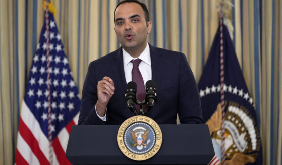 Rohit Chopra, director of the Consumer Financial Protection Bureau, speaks as President Joe Biden meets with his Competition Council to announce new actions to lower costs for families in the State Dining Room of the White House in Washington, D.C., on March 5.