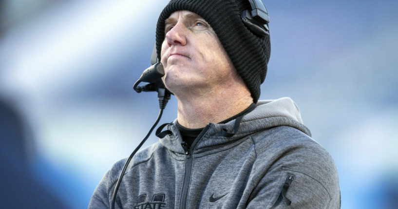 Then-Utah State head football coach Blake Anderson looks up at the videoboard late in the second half of the Famous Idaho Potato Bowl against Georgia State in Boise, Idaho, on Dec. 23, 2023.