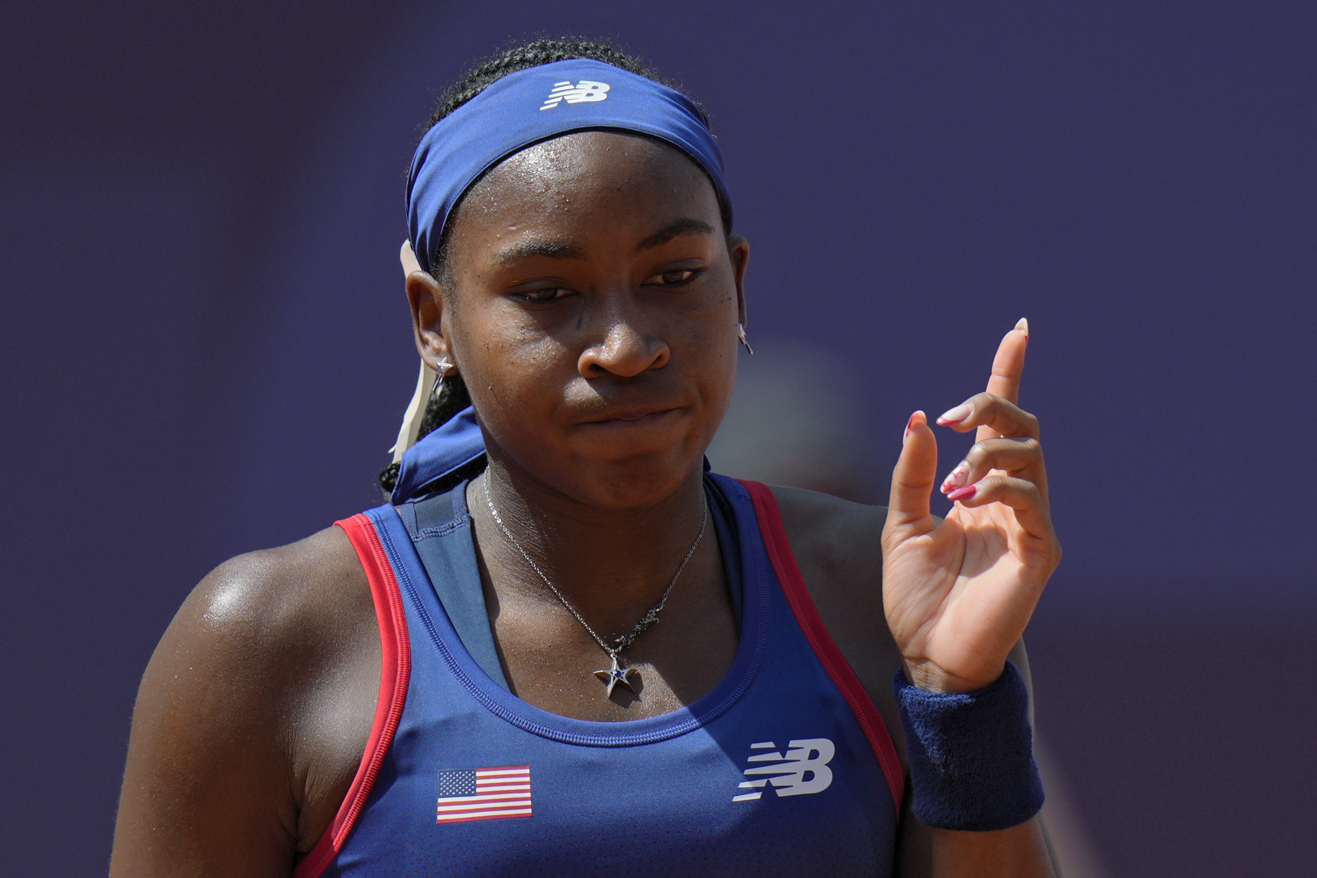 Coco Gauff of United States gestures as she plays against Donna Vekic of Croatia during their women's singles third round match at the Roland Garros stadium, at the 2024 Summer Olympics in Paris, France, on Tuesday.