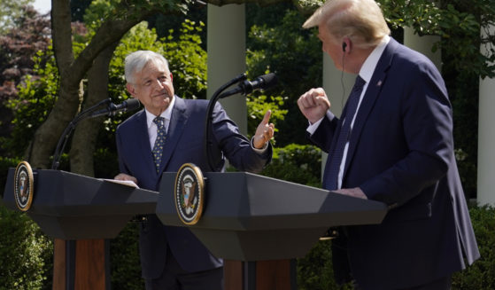 Mexico's President Andres Manuel Lopez Obrador, left, and then-President Donald Trump give a news conference before signing a joint declaration at the White House in Washington, D.C., on July 8, 2020.
