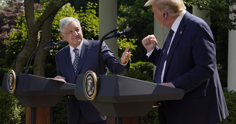 Mexico's President Andres Manuel Lopez Obrador, left, and then-President Donald Trump give a news conference before signing a joint declaration at the White House in Washington, D.C., on July 8, 2020.