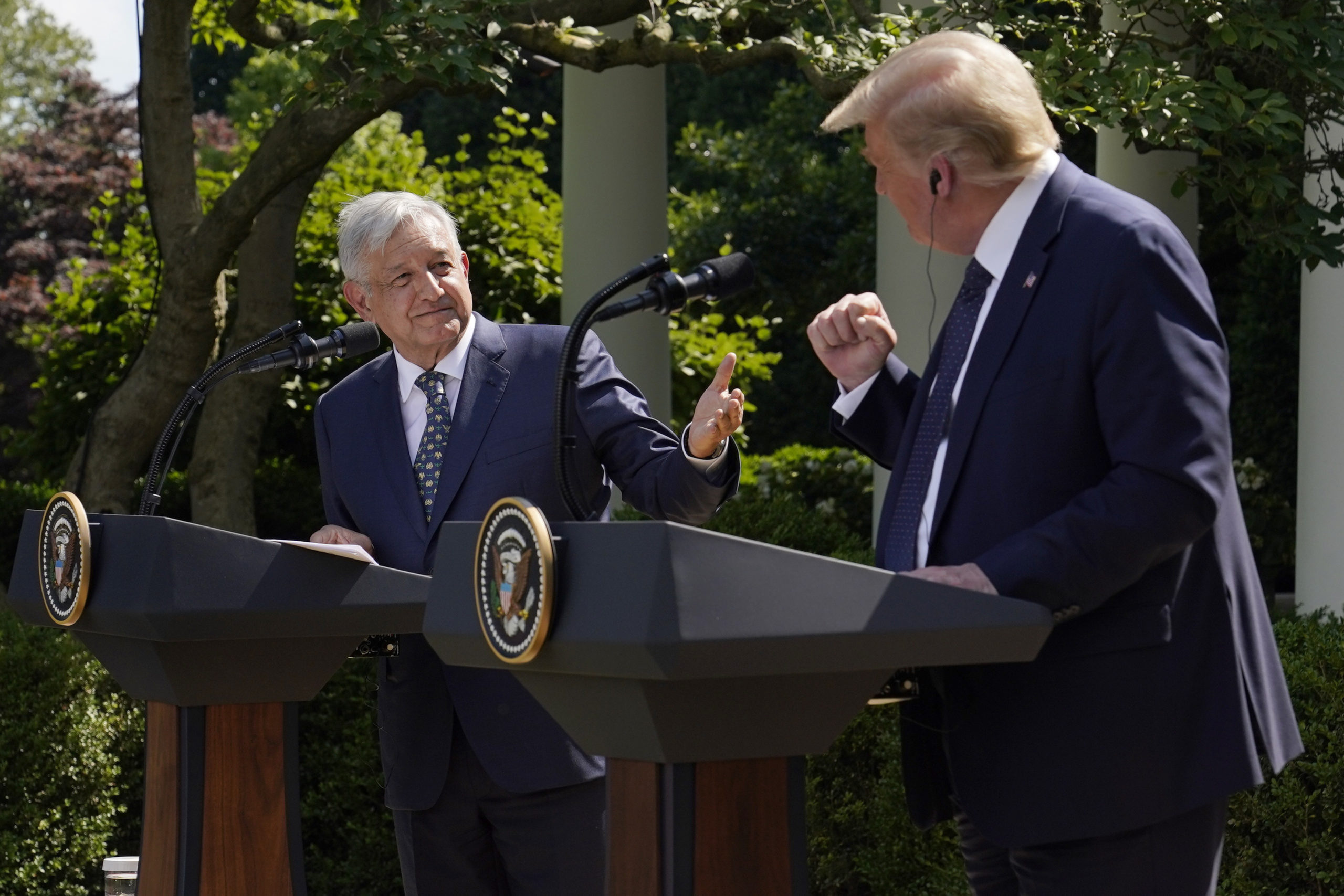 Mexico's President Andres Manuel Lopez Obrador, left, and then-President Donald Trump give a news conference before signing a joint declaration at the White House in Washington, D.C., on July 8, 2020.