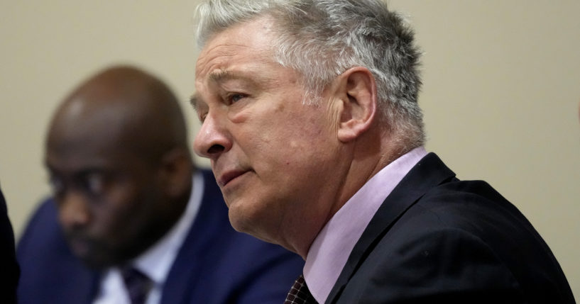 Actor Alec Baldwin listens during his hearing in Santa Fe County District Court in Santa Fe, New Mexico, on Wednesday.